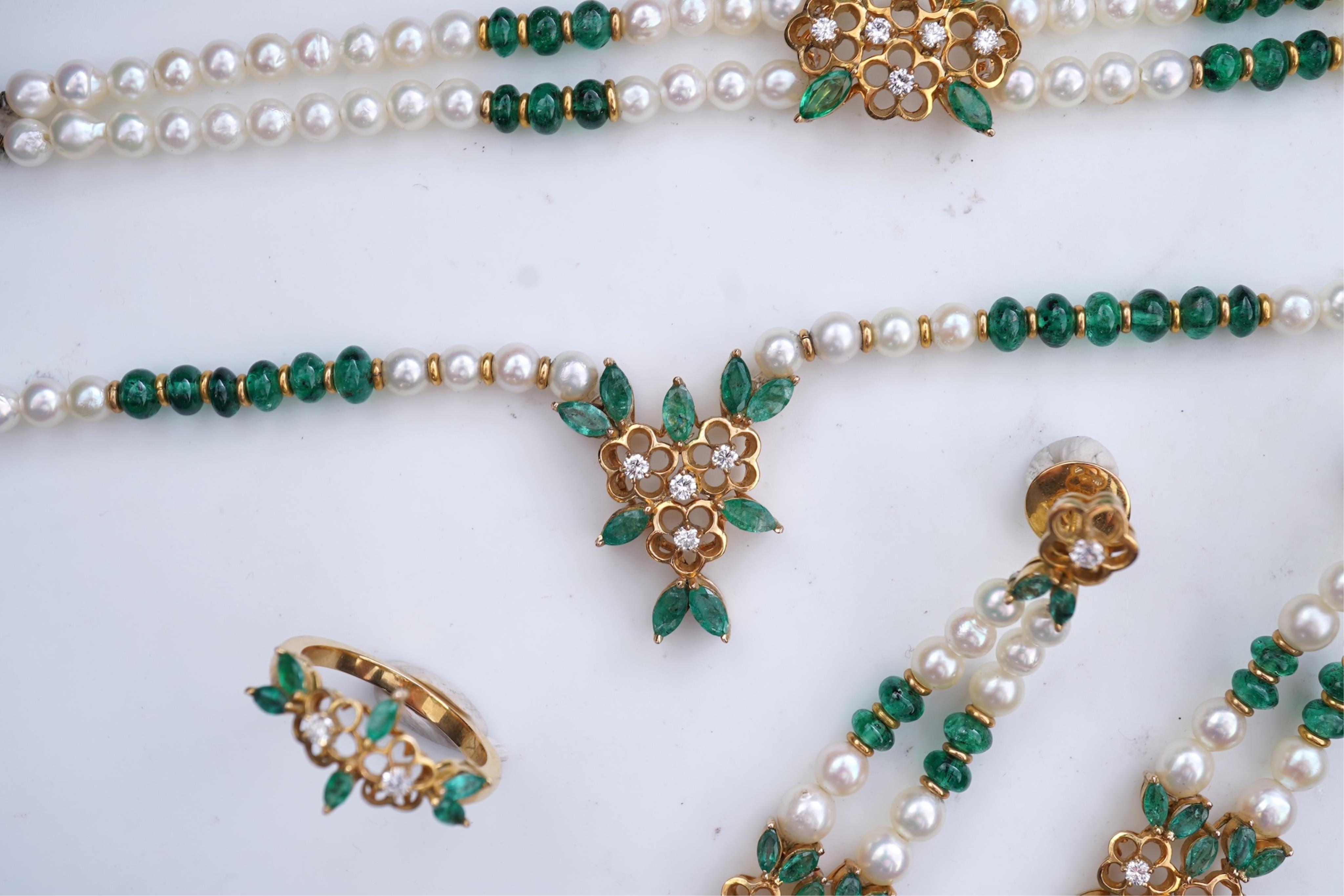 A cultured pearl, emerald and diamond parure